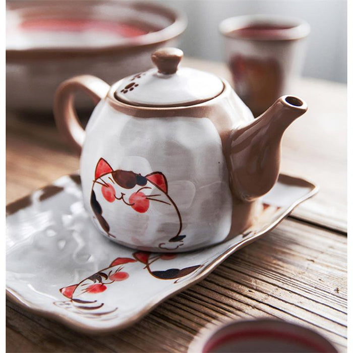 https://puppeeland.com/cdn/shop/products/japanese-cute-cat-tea-pot-and-cup-132381_350x@2x.jpg?v=1681012071